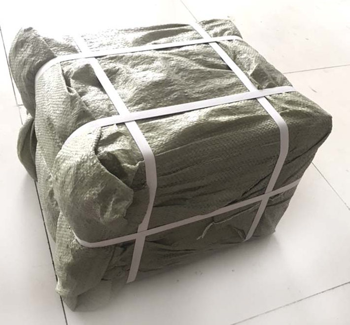 A wrapped and strapped item prepared for handling